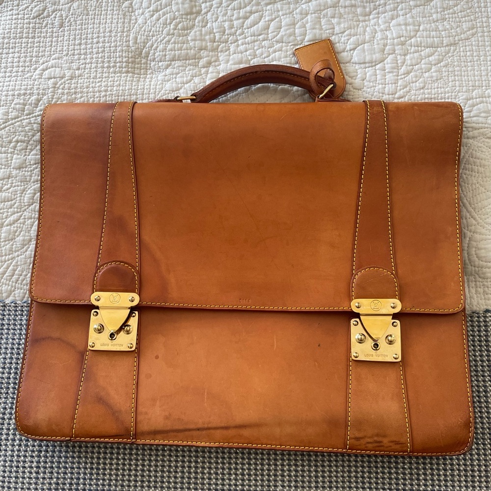 Louis Vuitton Leather Briefcase with Gold Clasps.